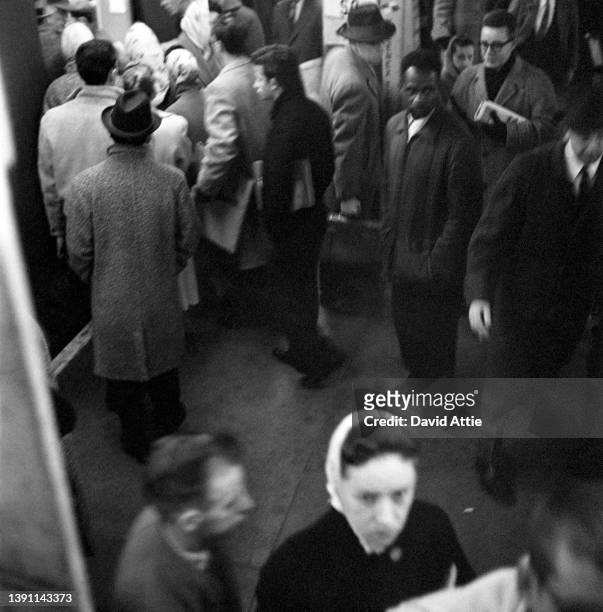Passengers Exiting the New York City subway at Times Square in January 1959 in New York City, New York.