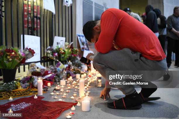 Fan reacts during a candlelight vigil in memory of Dwayne Haskins at Ohio Stadium on April 12, 2022 in Columbus, Ohio. Pittsburgh Steelers...