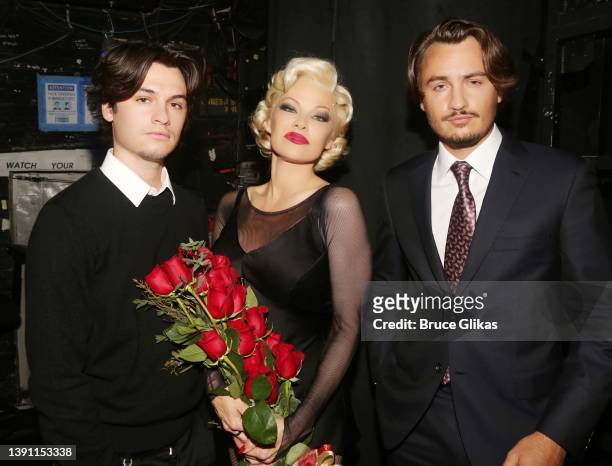 Dylan Jagger Lee, Pamela Anderson and Brandon Thomas Lee pose backstage during the opening night of her Broadway debut as Roxie Hart in the musical...