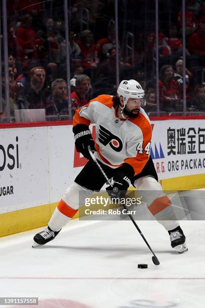 Nate Thompson of the Philadelphia Flyers skates with the puck against the Washington Capitals at Capital One Arena on April 12, 2022 in Washington,...