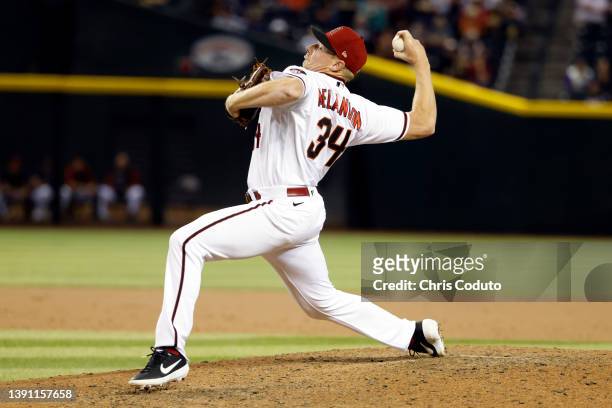Mark Melancon of the Arizona Diamondbacks pitches during the ninth inning against the Houston Astros at Chase Field on April 12, 2022 in Phoenix,...