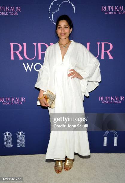 Actress Freida Pinto arrives at Rupi Kaur World Tour Secret Show at The Fig House on April 12, 2022 in Los Angeles, California.