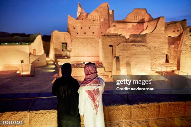 middle eastern couple visiting open air museum near riyadh - saudi arabia landscape stock pictures, royalty-free photos & images