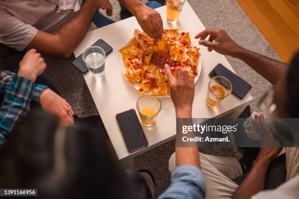 tasty looking mexican nachos - salty snack stock pictures, royalty-free photos & images
