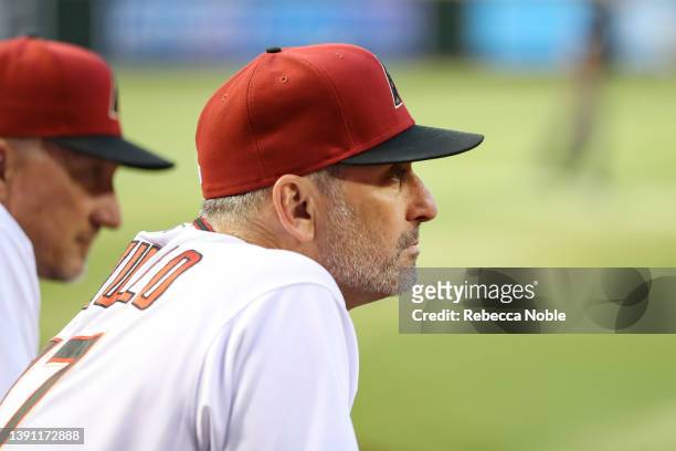 Manager Torey Lovullo of the Arizona Diamondbacks watches during their MLB game against the San Diego Padres at Chase Field on April 09, 2022 in...