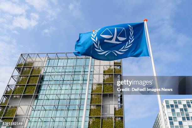 Den Haag, Netherlands, : Flag with the logo of the of the International Criminal Court on March 29, 2022 in Den Haag, Netherlands.