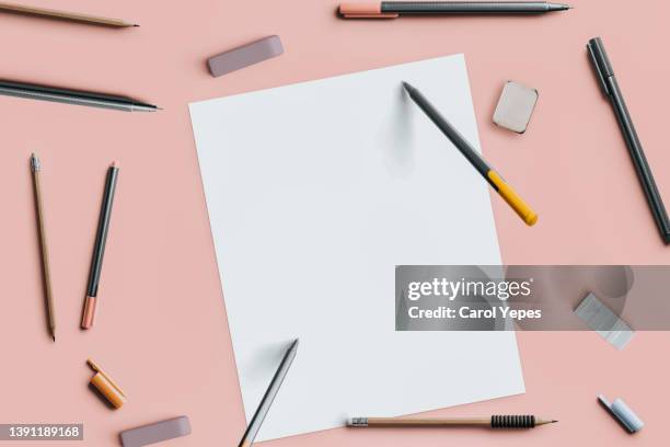 white empty sheet and colorful pencils.top view - office desk top view stockfoto's en -beelden