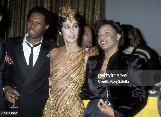 Singer Nile Rodgers, singer Cher and singer Alfa Anderson attend the Billboard Magazine's 1979 Disco Convention on February 28, 1979 at the New York...