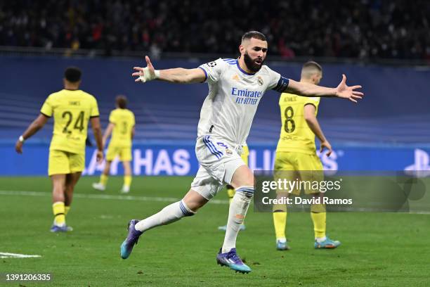 Karim Benzema of Real Madrid CF celebrates after scoring his team's second goal during the UEFA Champions League Quarter Final Leg Two match between...