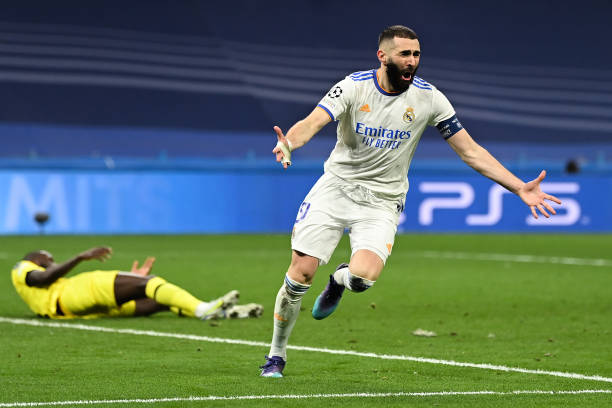 Karim Benzema of Real Madrid CF celebrates after scoring his team's second goal during the UEFA Champions League Quarter Final Leg Two match between...