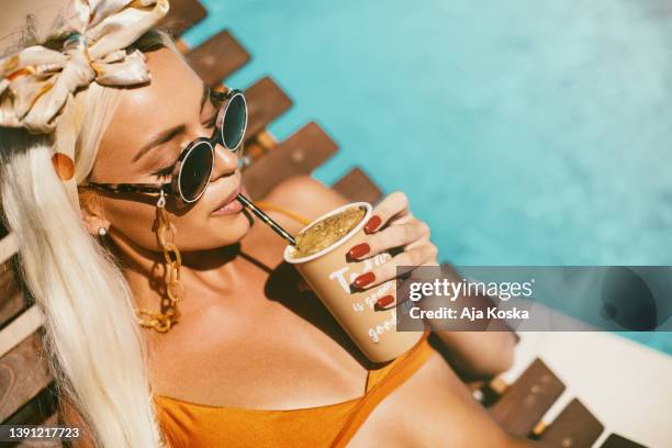 enjoying coffee and sun. - ice coffee drink stock pictures, royalty-free photos & images