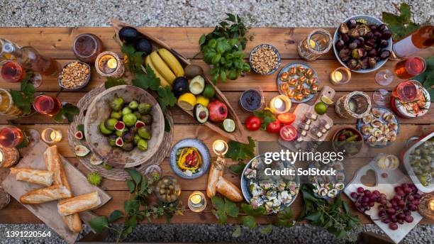 bright beautiful dinner - rustic dinner party stock pictures, royalty-free photos & images