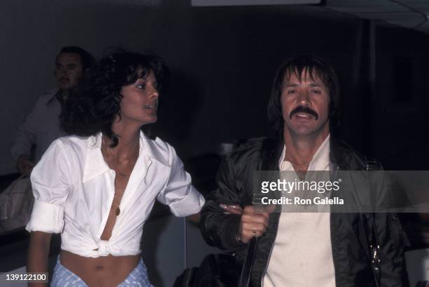 Singer Sonny Bono and girlfriend Susie Coelho on April 5, 1977 arrive at the Los Angeles International Airport in Los Angeles, California.