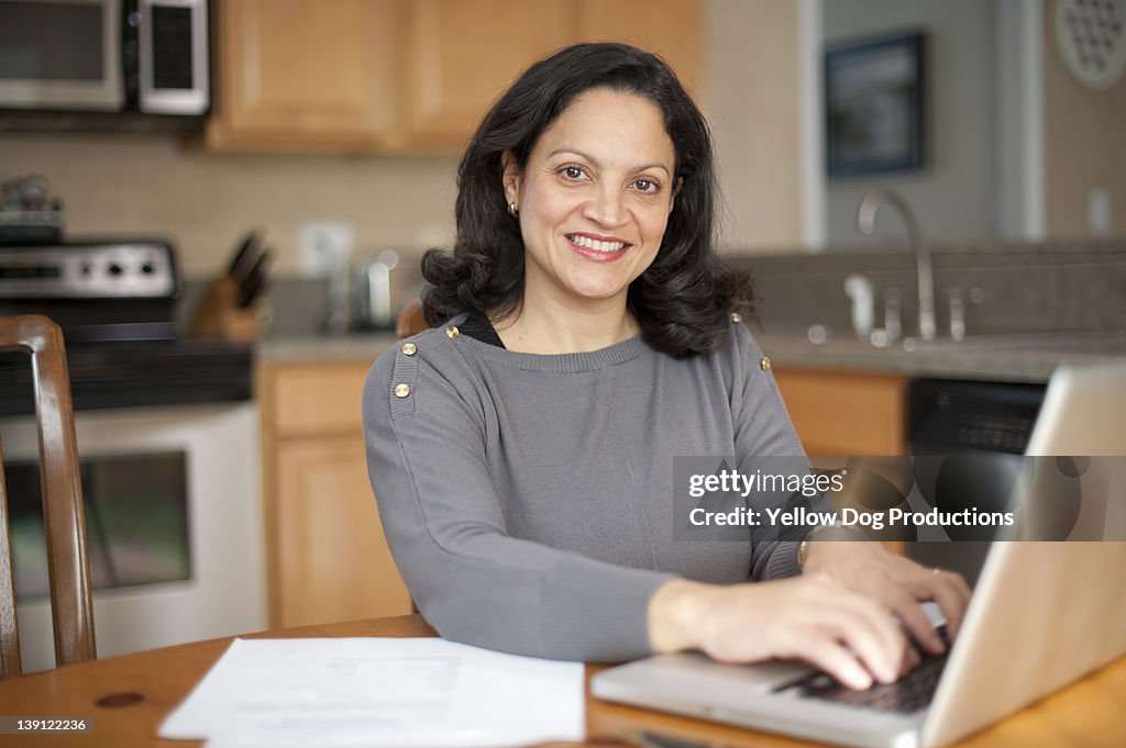 Mature Woman Working on Computer at Home