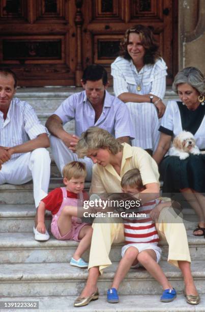 Spanish Royal Juan Carlos I, British Royal Charles, Prince of Wales, British Royal Diana, Princess of Wales , wearing a yellow jumpsuit, British...