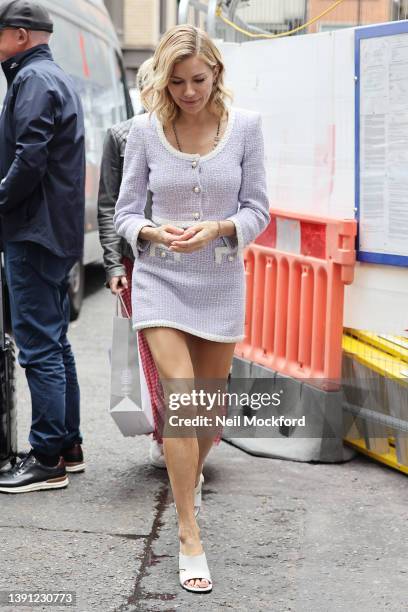 Sienna Miller arriving back at her hotel whilst promoting new Netflix series 'Anatomy of a Scandal' on April 13, 2022 in London, England.