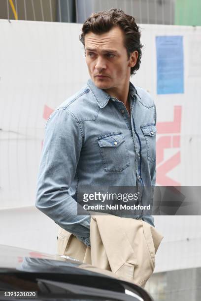 Rupert Friend arriving back at his hotel whilst promoting new Netflix series 'Anatomy of a Scandal' on April 13, 2022 in London, England.