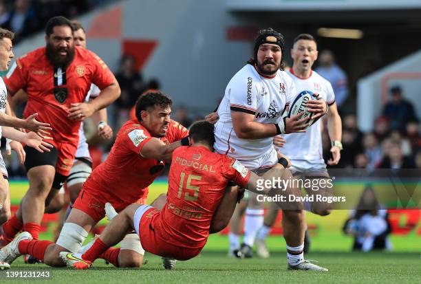 Tom O'Toole of Ulster is tackled during the Heineken Champions Cup match between Stade Toulousain and Ulster Rugby at Stadium de Toulouse on April...