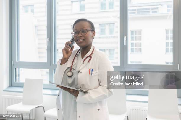 Doctors Ringing Phone 19 Female Doctor Talking On Cordless Phone Stock Photos, High-Res ...