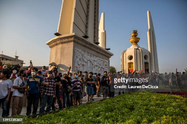 Anti-government protesters gather for a Songkran themed rally at Democracy Monument on April 13, 2022 in Bangkok, Thailand. Songkran, the traditional...