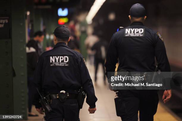 Officers patrol the subway platform at the Atlantic Avenue subway station on April 13, 2022 in the Sunset Park neighborhood of Brooklyn in New York...