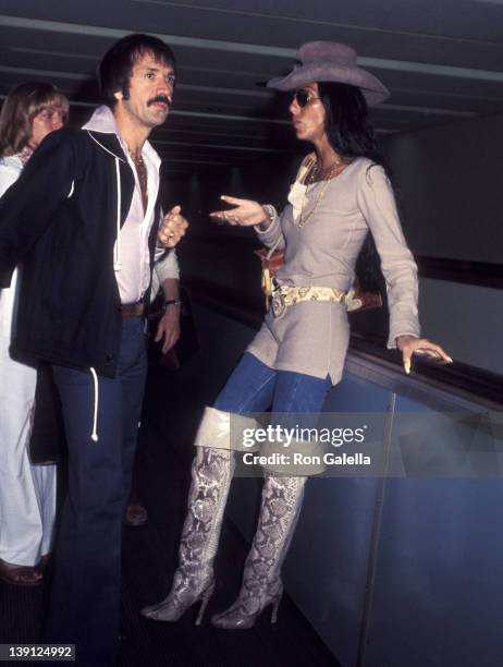 Singer Sonny Bono and singer Cher on June 12, 1977 arrive at the Los Angeles International Airport in Los Angeles, California.