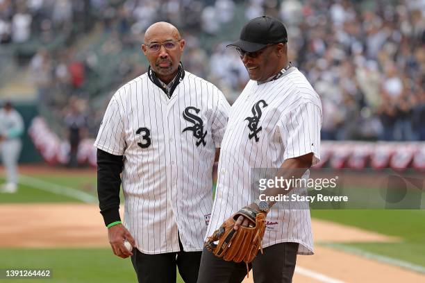 Former Chicago White Sox players, Harold Baines and Bo Jackson, speak on the field prior to a game between the Chicago White Sox and the Seattle...