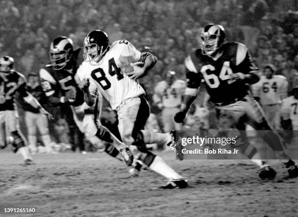 Pittsburgh Steelers TE Randy Grossman is chased by Rams LB Jack Reynolds during game action of Los Angeles Rams against Pittsburgh Steelers, December...