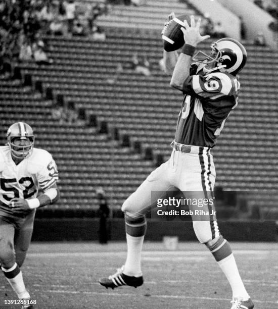 Los Angeles Rams Receiver Lance Rentzel makes a reception and is immediately tackled by San Francisco 49'ers Bruce Taylor during game of Los Angeles...