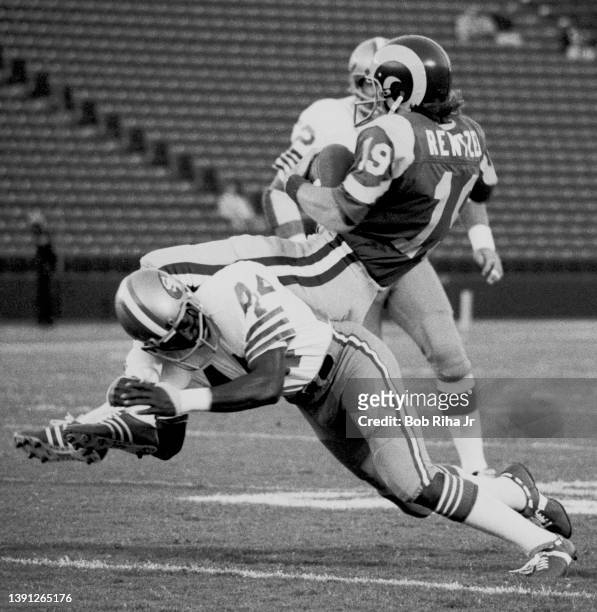 Los Angeles Rams Receiver Lance Rentzel makes a reception and is immediately tackled by San Francisco 49'ers Bruce Taylor during game of Los Angeles...
