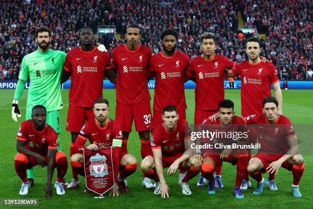 The Liverpool team pose for a photo ahead of the UEFA Champions League Quarter Final Leg Two match between Liverpool FC and SL Benfica at Anfield on...