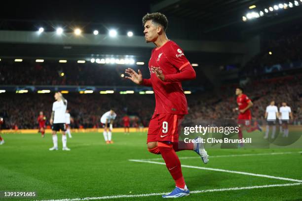 Roberto Firmino of Liverpool celebrates after scoring their team's second goal during the UEFA Champions League Quarter Final Leg Two match between...