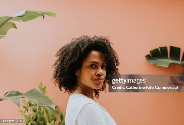 portrait of a beautiful black woman - woman portrait looking away stock pictures, royalty-free photos & images
