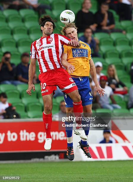 Wayne Srhoj of the Heart is challenged by Zachary Anderson of Gold Coast United during the round 20 A-League match between the Melbourne Heart and...