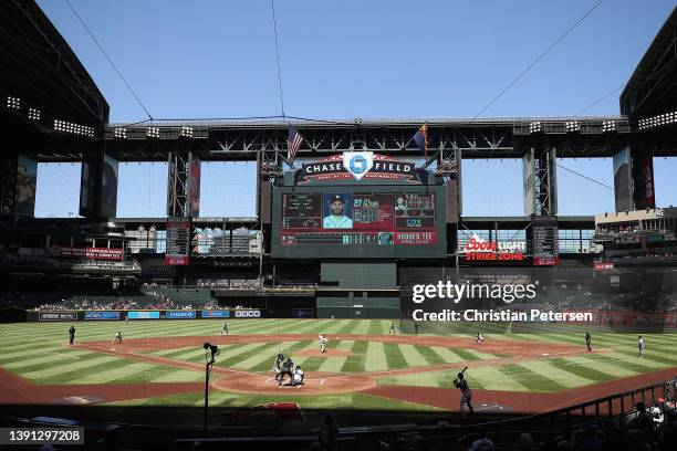 General view of action as starting pitcher Merrill Kelly of the Arizona Diamondbacks pitches against the Houston Astros during the first inning of...