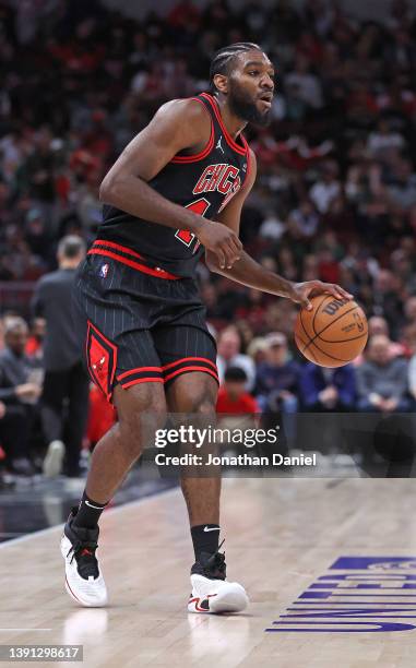 Patrick Williams of the Chicago Bulls advances the ball as he looks to pass against the Boston Celtics at the United Center on April 06, 2022 in...