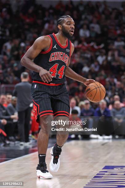 Patrick Williams of the Chicago Bulls advances the ball as he looks to pass against the Boston Celtics at the United Center on April 06, 2022 in...