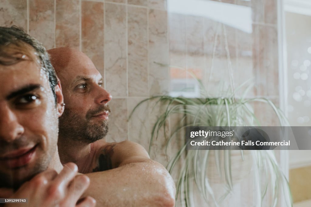 Closeup Of A Gay Couple Enjoying A Romantic Moment In The Shower High-Res  Stock Photo - Getty Images