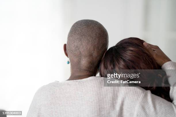 mother and daughter embrace - cancer patient with family stock pictures, royalty-free photos & images