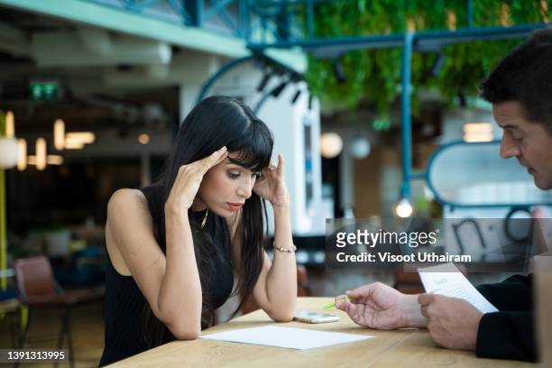 stressed woman applicant feeling nervous at job interview while hr reading resume,fear of fail concept. - negative emotion fotografías e imágenes de stock