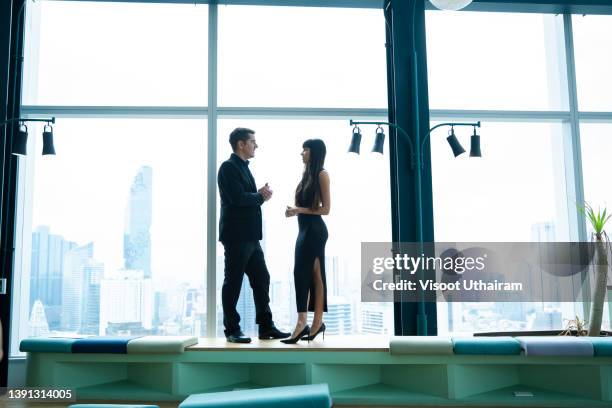 presenting business plan,business people talking presenting business plan in a modern office. - dress code stock pictures, royalty-free photos & images