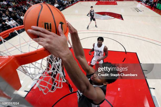 Yohan Traore of World Team dunks against World Team in the first quarter during the Nike Hoop Summit at Moda Center on April 08, 2022 in Portland,...