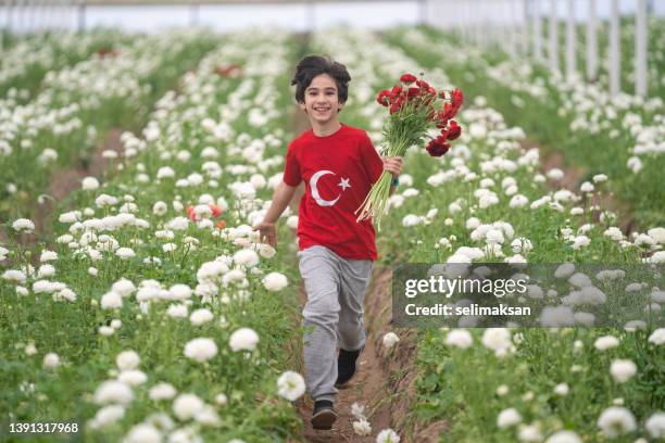 schoolboy with turkish flag - april imagens e fotografias de stock