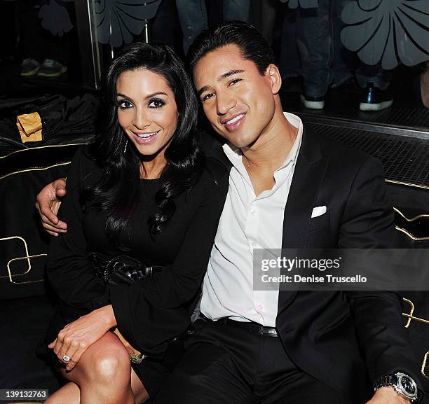 Courtney Mazza and Mario Lopez attend the Sports Illustrated Overtime after party at the Bank nightclub at the Bellagio Hotel and Casino on February...