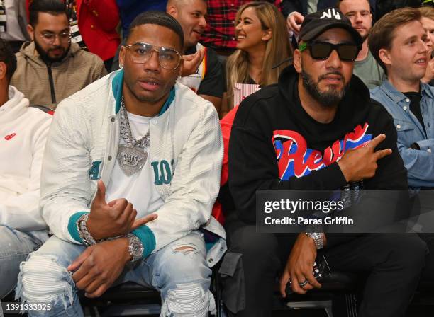 Rapper Nelly and Swizz Beatz attend the game between the Charlotte Hornets and the Atlanta Hawks during the 2022 Play-In Tournament on April 13, 2022...