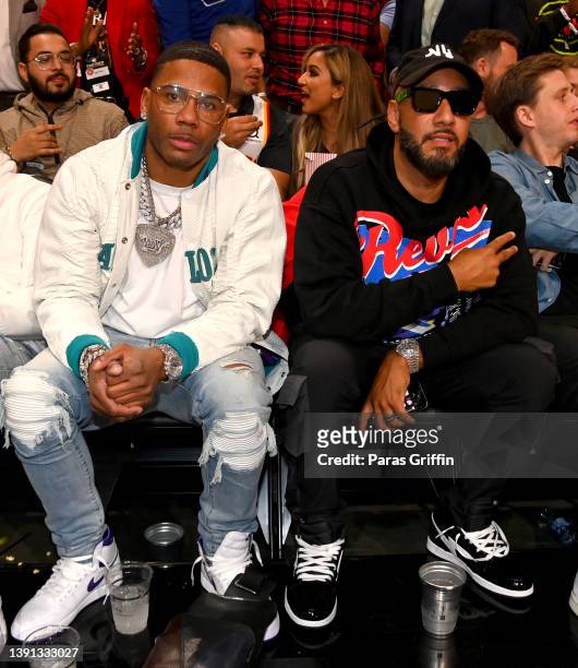 Rapper Nelly and Swizz Beatz attend the game between the Charlotte Hornets and the Atlanta Hawks during the 2022 Play-In Tournament on April 13, 2022...