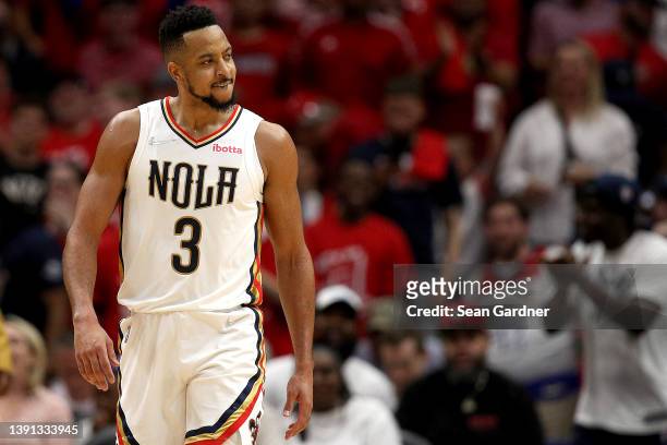McCollum of the New Orleans Pelicans reacts after scoring a three-point basket during the second quarter of the 2022 NBA Play-In Tournament against...
