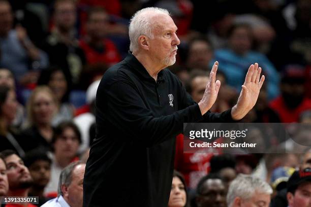 Head coach Gregg Popovich of the San Antonio Spurs directs his team from the side line during the first quarter of the 2022 NBA Play-In Tournament...