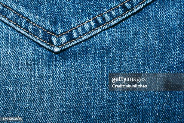 full frame shot of blue jeans - jeans poche photos et images de collection