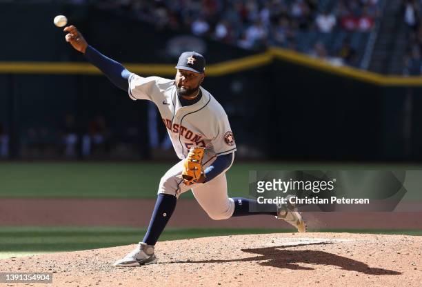Relief pitcher Cristian Javier of the Houston Astros pitches against the Arizona Diamondbacks during the sixth inning of the MLB game at Chase Field...
